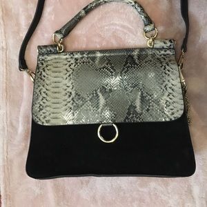 Velvet and snakeskin handbag